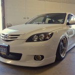 2013_stretch_and_poke_fitted_inside_bagged_mazda_3_airlift