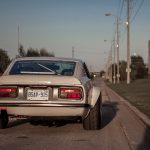 tim-corbin-72-g-nose-datsun-240-front-three-road-2-hr